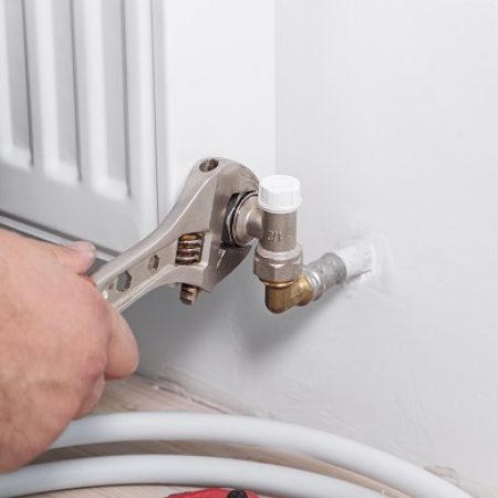 Plumber repairing in Luton