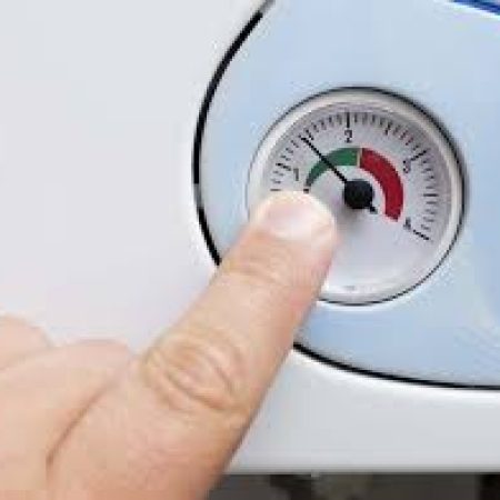 Gas Safe engineer in St Neots installing boiler and central heating system